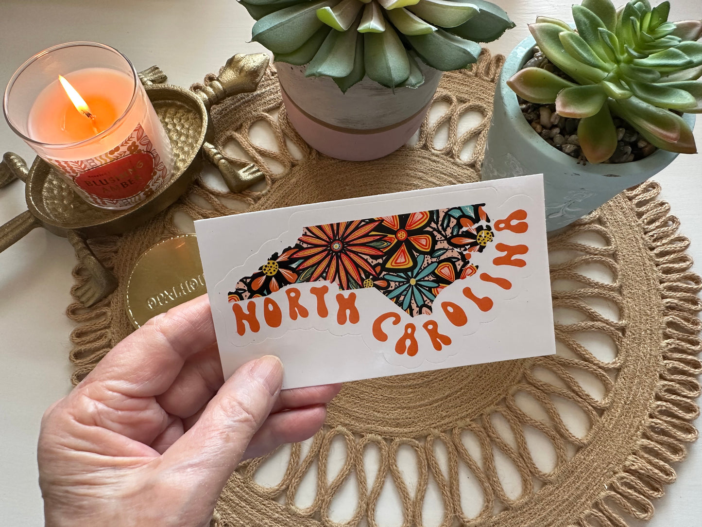 North Carolina State Sticker | Vinyl Artist Designed Illustration Featuring North Carolina State Outline Filled With Retro Flowers with Retro Hand-Lettering Die-Cut Stickers